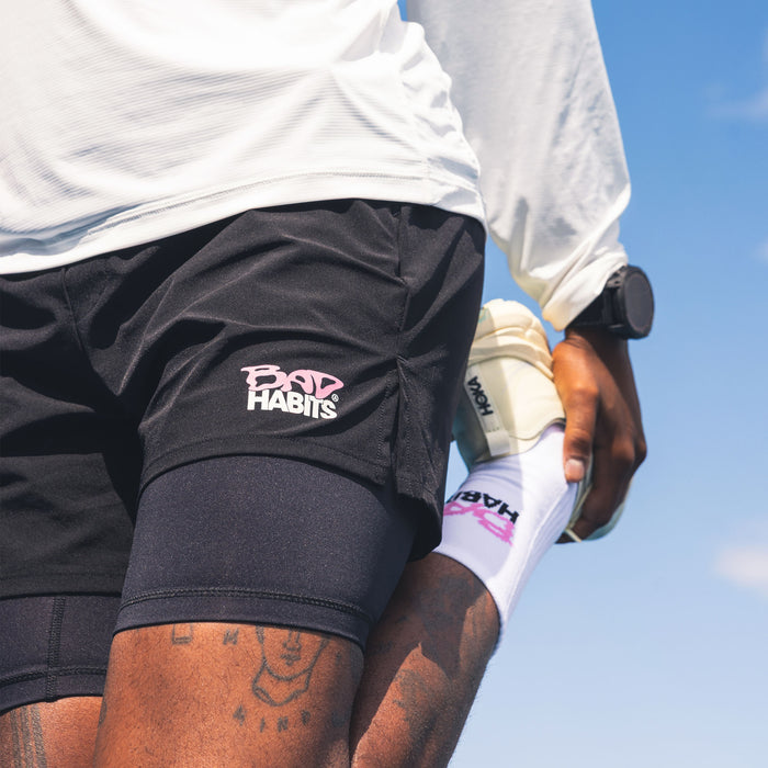 Bad Habits Running Socks (White) onfeet
