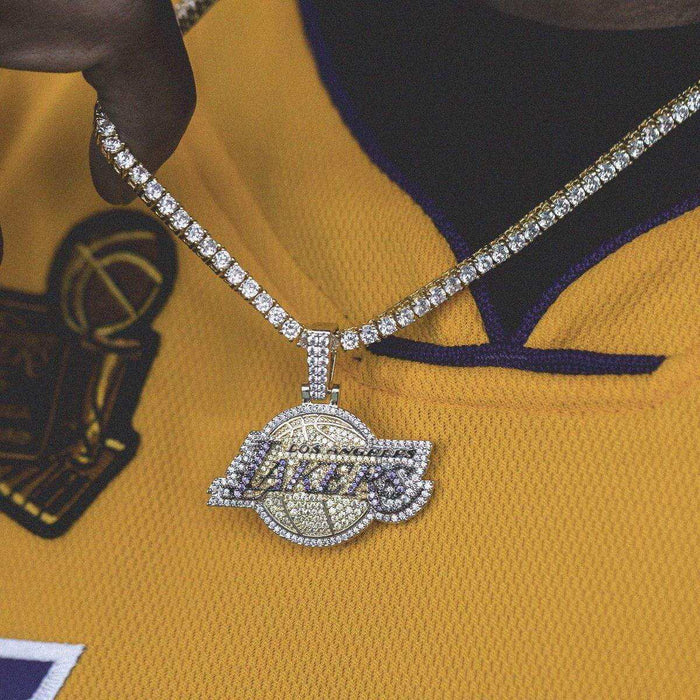 LA Lakers Pendant covered in corresponding color CZ stones, on a matching 20” 3mm Tennis Chain in yellow gold, worn by a male model in a LA Lakers Jersey.
