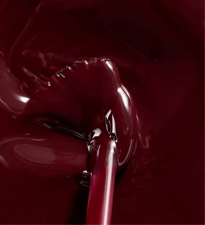 Texture du pinceau du vernis Color Strong rouge noir Poderm