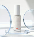 Vernis Nail Corrector illuminateur minéral blanc nacré Poderm sur support design